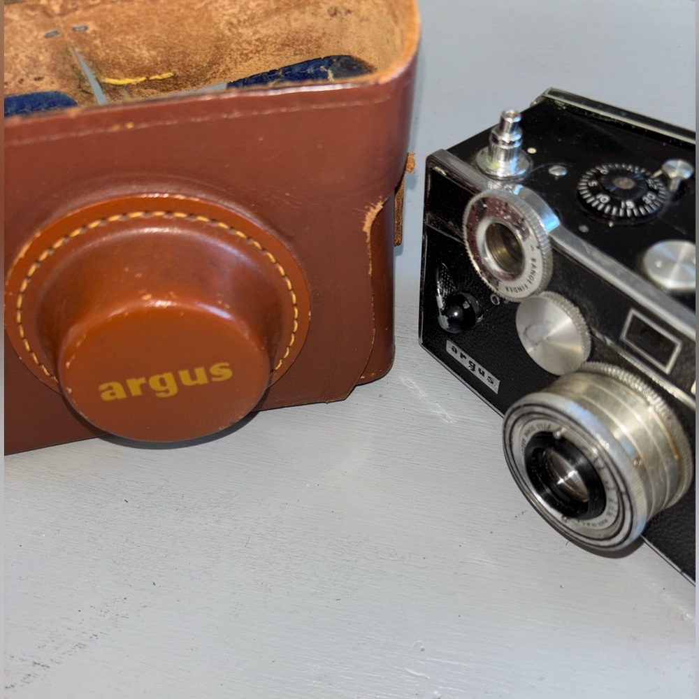 Vintage Black Camera with Brown Leather Case